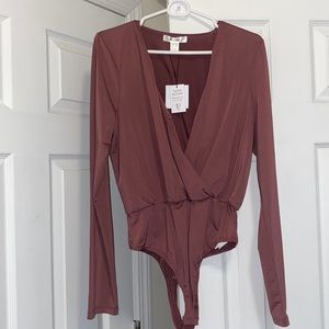 BRAND NEW Revamped Body Suit!